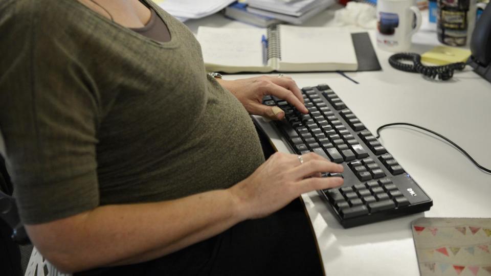 A pregnant woman at work (file image)