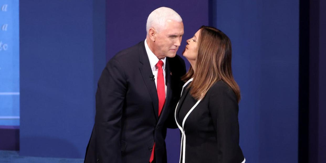 Vice President Mike Pence is joined on stage by his wife Karen Pence after the conclusion of the 2020 vice presidential campaign debate held on the campus of the University of Utah in Salt Lake City, Utah, U.S., October 7, 2020.