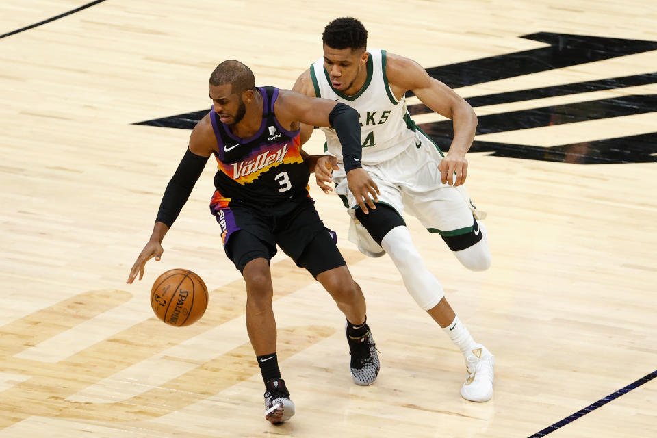 Chris Paul of the Phoenix Suns and Giannis Antetokounmpo of the Milwaukee Bucks are on track to meet in the NBA Finals. (Photo by Christian Petersen/Getty Images)