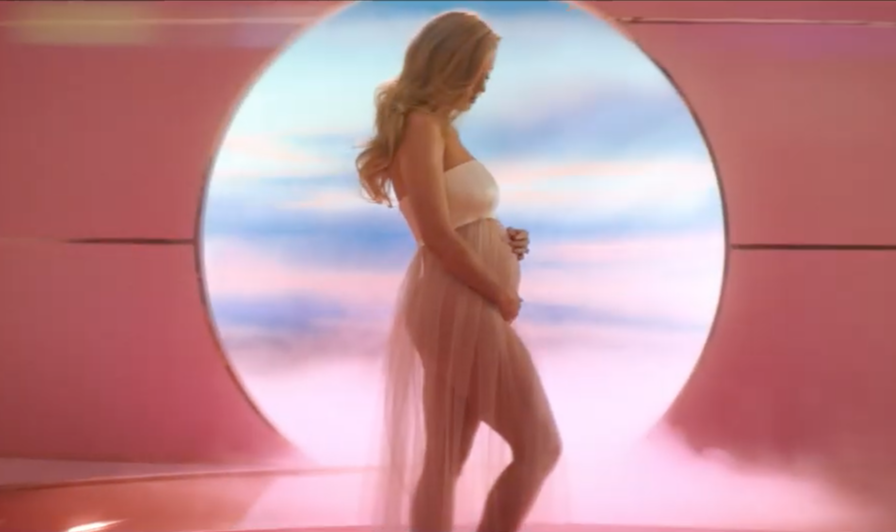 Katy Perry revealing her pregnancy in her music video for 'Never Worn White'.