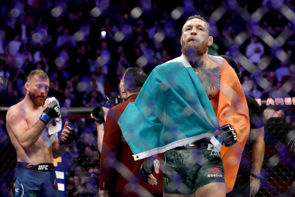 Conor McGregor celebrates his first round TKO victory against Donald Cerrone in a welterweight bout during UFC 246 at T-Mobile Arena.