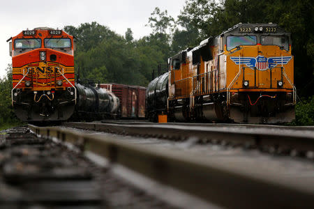 Train engines stand still on tracks in Orange, Texas, U.S., on August 30, 2017. REUTERS/Jonathan Bachman