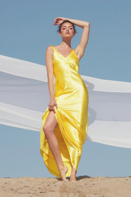Perfectly Classy Yellow Satin Strappy Maxi Dress. Image via Lulus.