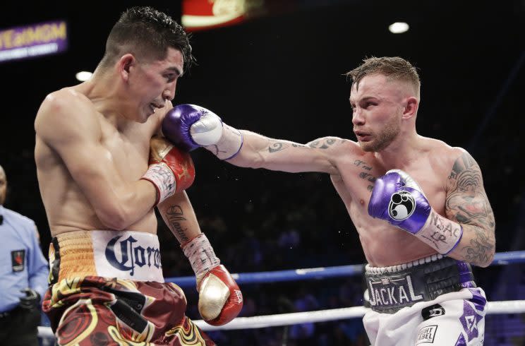 Carl Frampton (R) landed only 105 of 405 attempts on Saturday night. (AP)