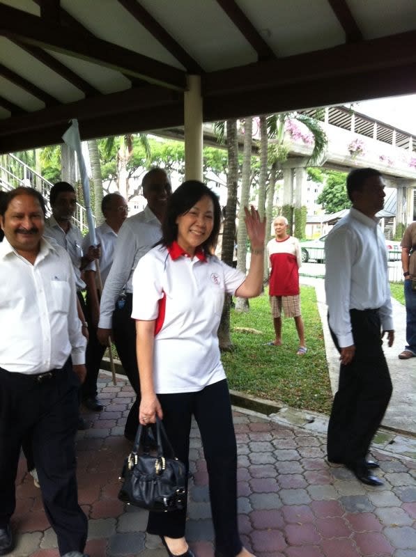 Nomination Day: Lina Chiam arrives at Tao Nan school. She will contest Potong Pasir SMC and go up against PAP's Seetoh Yi-Pin.