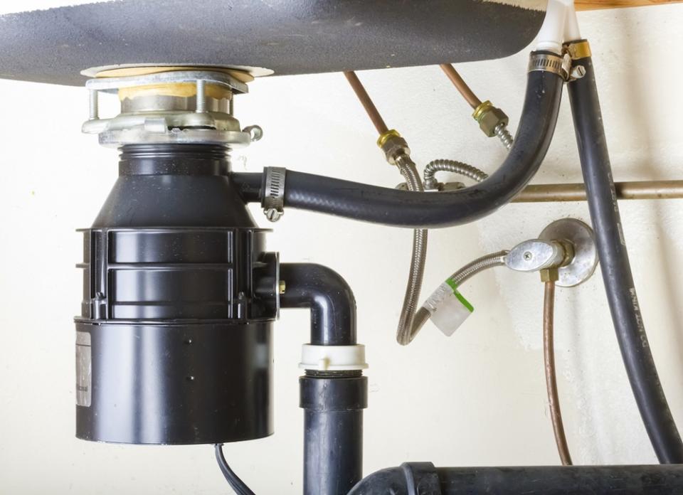 <body> <p>There's something in the kitchen that stinks—your <a rel="nofollow noopener" href=" http://www.bobvila.com/articles/garbage-disposal-smell/?bv=yahoo" target="_blank" data-ylk="slk:garbage disposal;elm:context_link;itc:0;sec:content-canvas" class="link ">garbage disposal</a>. This fixture traps food particles and bacteria, so it's no wonder that it needs frequent cleaning. Take a box of baking soda from the pantry and sprinkle about a half cup down the drain. Then, add vinegar to create cleansing bubbles. Once the mixture has been allowed to work for a couple minutes, flush out the sink with hot water. </p> <p><strong>Related: <a rel="nofollow noopener" href=" http://www.bobvila.com/slideshow/10-ingenious-home-uses-for-baking-soda-46264#.VrA9rmTysy4?bv=yahoo" target="_blank" data-ylk="slk:10 Ingenious Home Uses for Baking Soda;elm:context_link;itc:0;sec:content-canvas" class="link ">10 Ingenious Home Uses for Baking Soda</a> </strong> </p> </body>