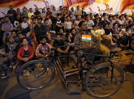 Cricket - India v Pakistan - World Twenty20 cricket tournament - Chandigarh - 19/03/16. Fans watch live telecast of match. REUTERS/Ajay Verma