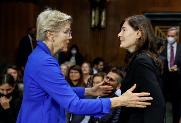Sen. Elizabeth Warren (D-Mass.), who recommended Rikelman to the White House for a judgeship, greets Rikelman ahead of her Senate confirmation hearing.