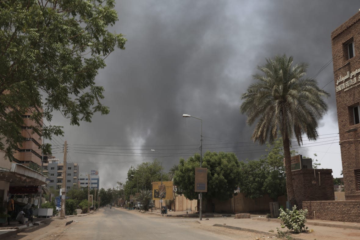 Smoke is seen rising in Khartoum, Sudan, Saturday, April 15, 2023. (AP Photo/Marwan Ali)