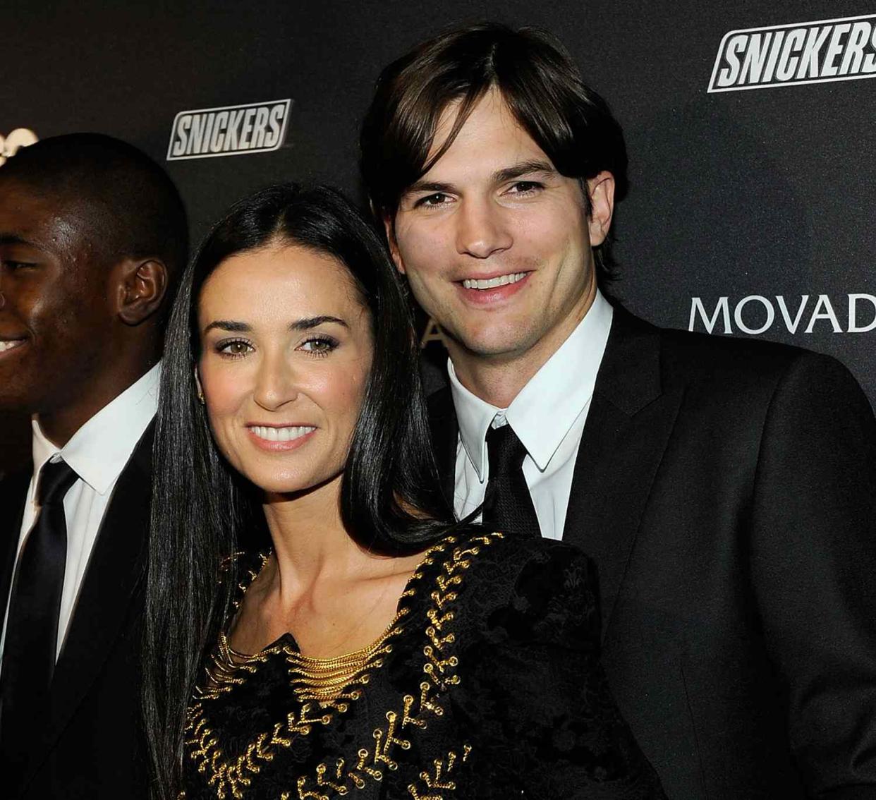 Demi Moore and Ashton Kutcher attend GQ's The Gentlemen's Ball at The Edison Ballroom on October 27, 2010 in New York City