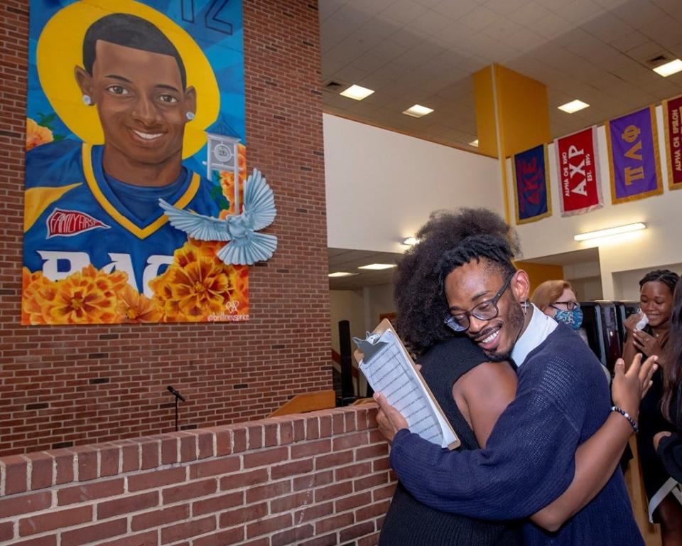 A mural depicting Danroy Henry is displayed at Pace University's campus in Pleasantville, New York.