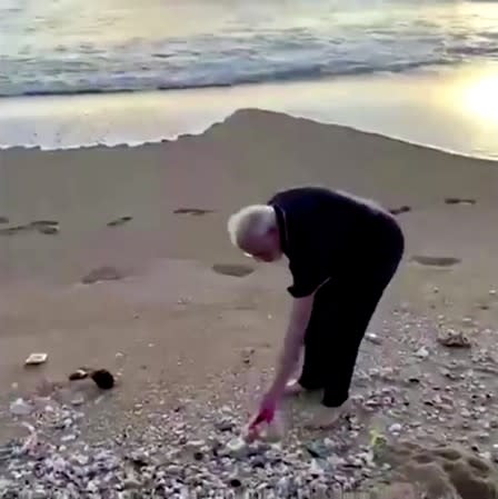 India's PM Modi picks up plastic trash at beach in Mamallapuram