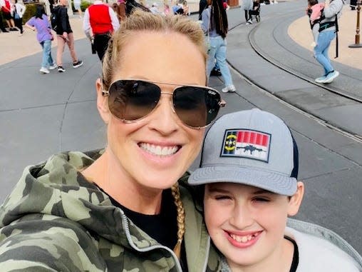 Heidi Borst and her son in Disney