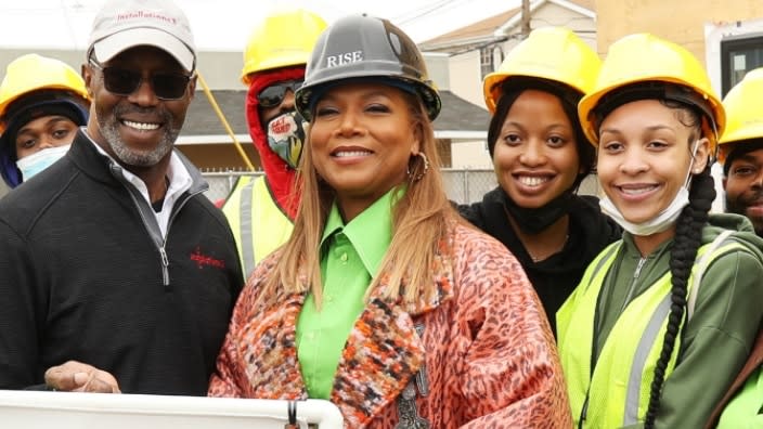 Actress-rapper Queen Latifah (center) poses at the groundbreaking celebration for a new development in Newark, New Jersey, on Tuesday. (Photo: Bennett Raglin/Getty Images)