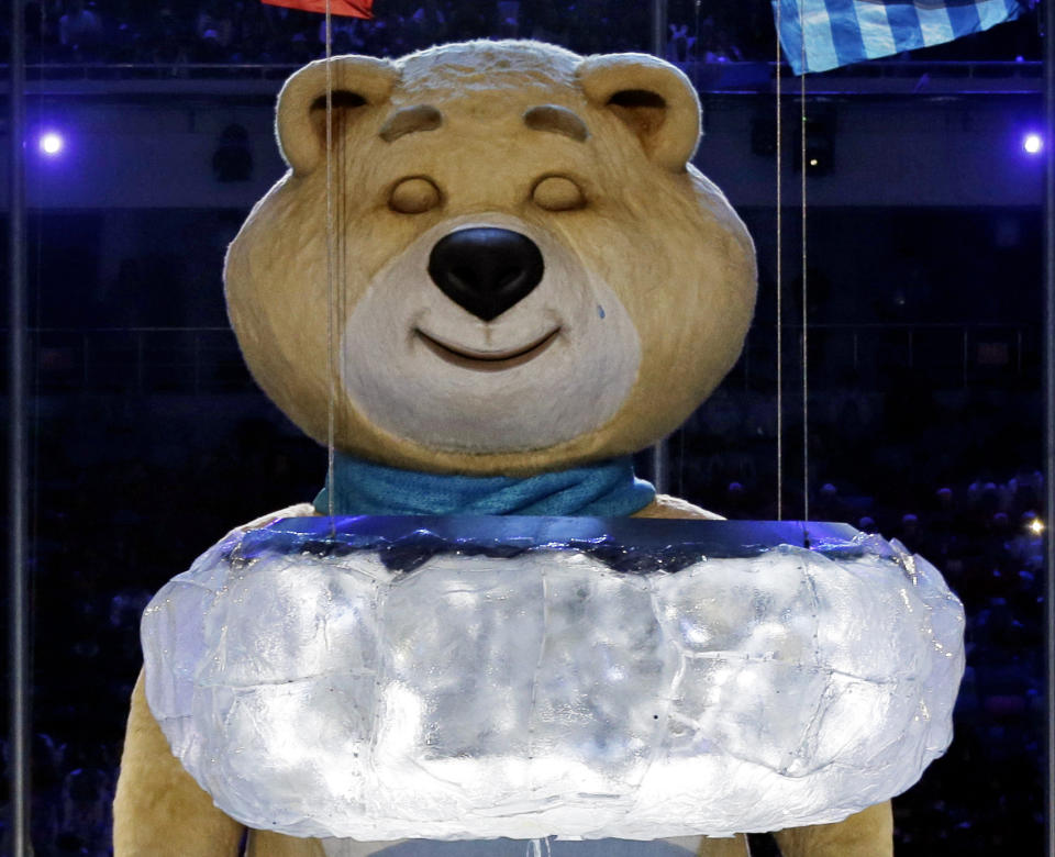 One of the Sochi Olympic mascots sheds a tear after extinguishing the Olympic flame during the closing ceremony of the 2014 Winter Olympics, Sunday, Feb. 23, 2014, in Sochi, Russia. (AP Photo/Charlie Riedel)