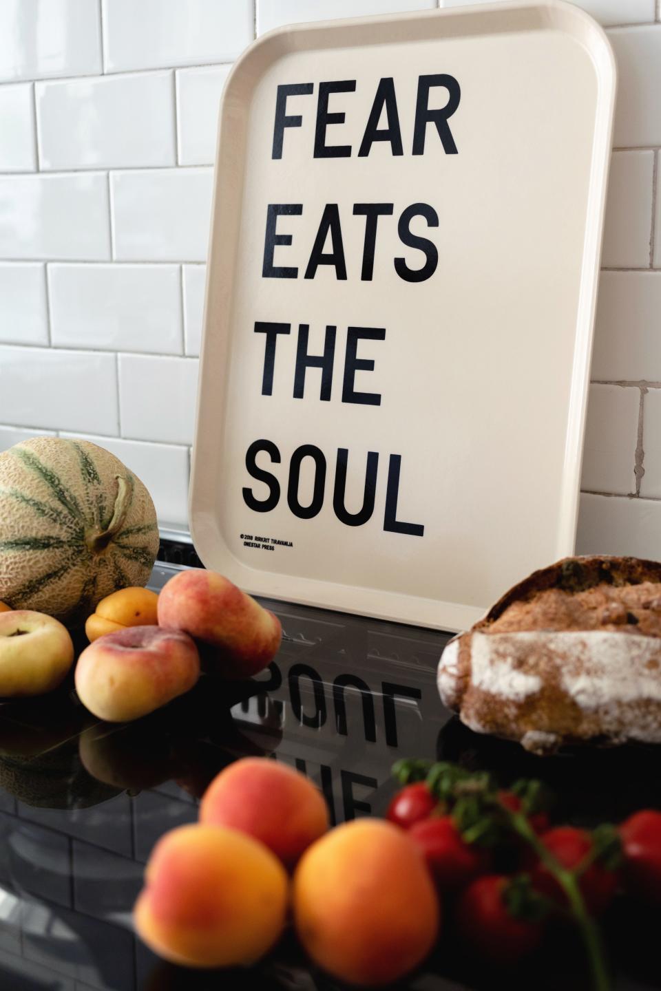 A tray by artist Rikrit Tiravanija is on display in the kitchen. The fruits and bread are from Alex’s favorite local market, Mercato Comunale Wagner.