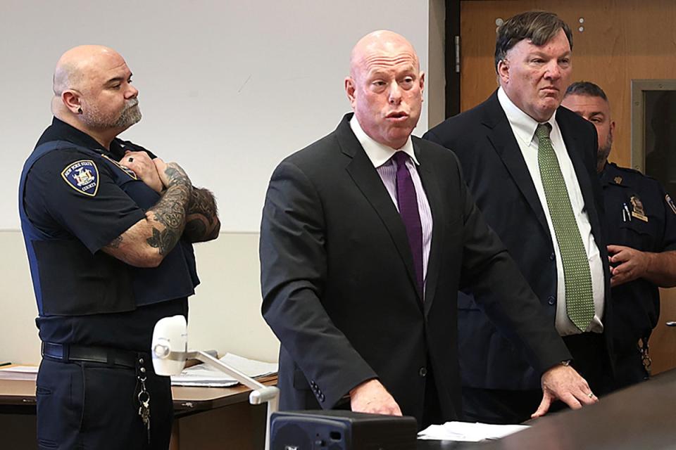 Rex Heuermann, right, appears in Suffolk County Supreme Court with his attorney, Michael Brown, Wednesday 15 November 2023, in Riverhead, New York (AP)