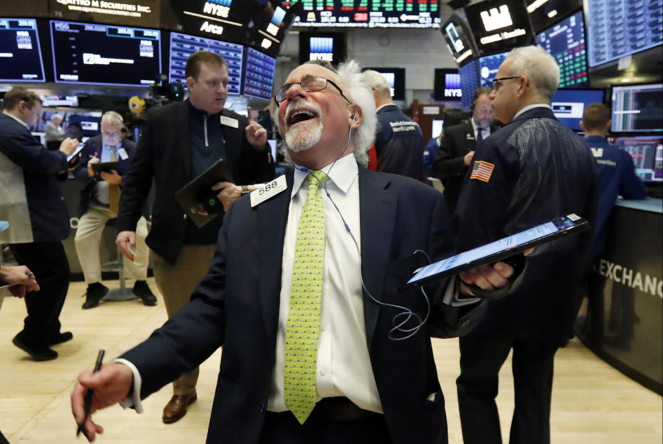 Trader Peter Tuchman laughs as he works on the floor of the New York Stock Exchange on March 13, 2019. U.S. stocks opened broadly higher on Wall Street Wednesday, powered by technology and health care companies. (Photo: ASSOCIATED PRESS)