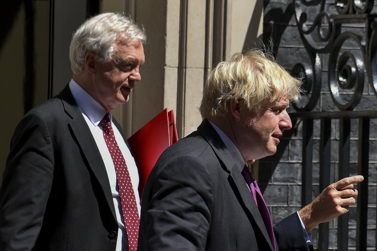 Britain's Secretary of State for Exiting the European Union (Brexit Minister) David Davis (L) and Britain's Foreign Secretary Boris Johnson (R) leave 10 Downing Street in central London after attending the weekly cabinet meeting on June 26, 2018. British MPs overwhelmingly approved on Monday long-awaited plans to build a third runway at London Heathrow, Europe's busiest airport, after decades of acrimonious debate over its potential impact. (Photo by Alberto Pezzali/NurPhoto via Getty Images)