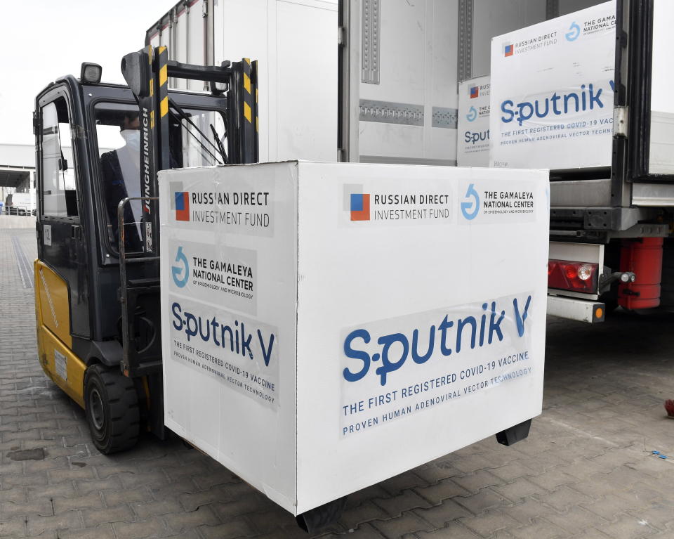 Boxes of Sputnik V vaccines are unloaded from a truck at a warehouse of Hungaropharma, a Hungarian pharmaceutical wholesale company, in Budapest, Hungary, Thursday, March 4, 2021. (Zoltan Mathe/MTI via AP)