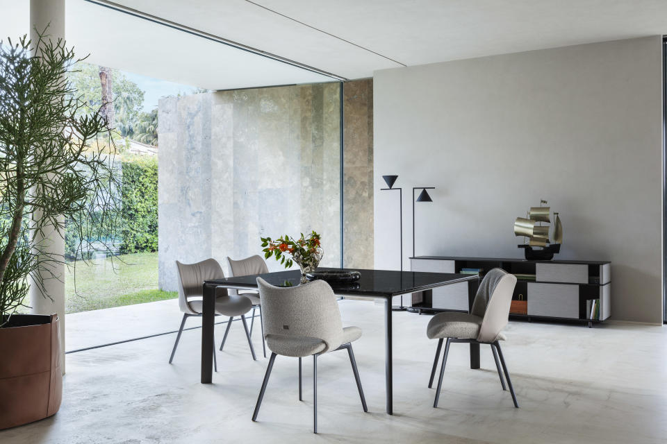 The Homey table and Nice chairs designed by Nice” graphic chair and “Homey” minimal table designed by GamFratesi for Poltrona Frau. - Credit: Courtesy of Poltrona Frau