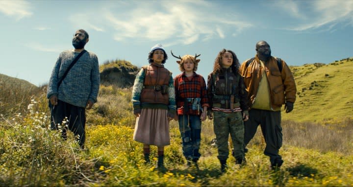 Five people stand in a field in Sweet Tooth season 3.