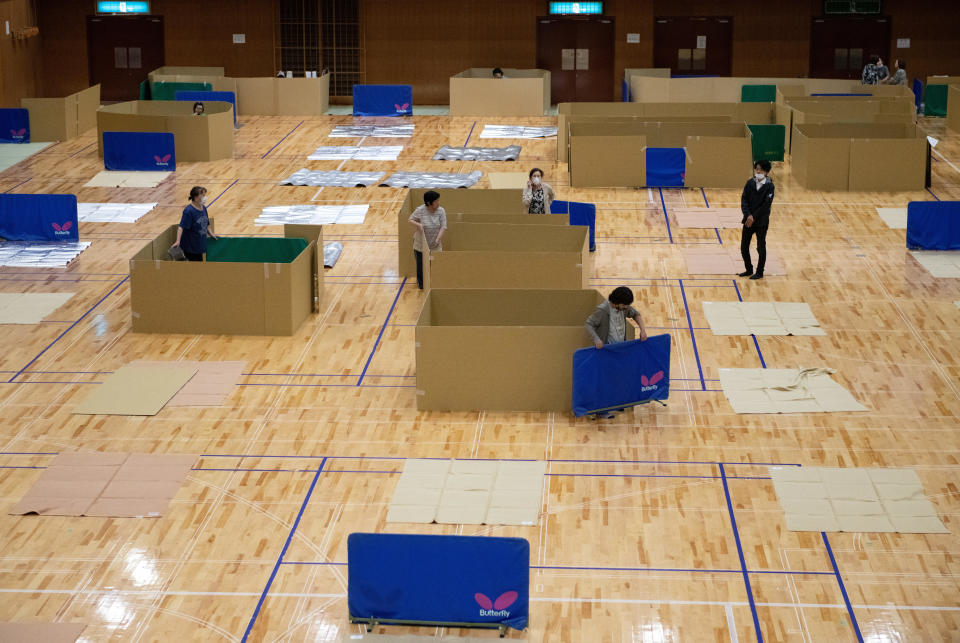 People made homeless by flooding and landslides shelter in a gymnasium in Yatsushiro, Japan,   July 6, 2020. / Credit: Carl Court/Getty