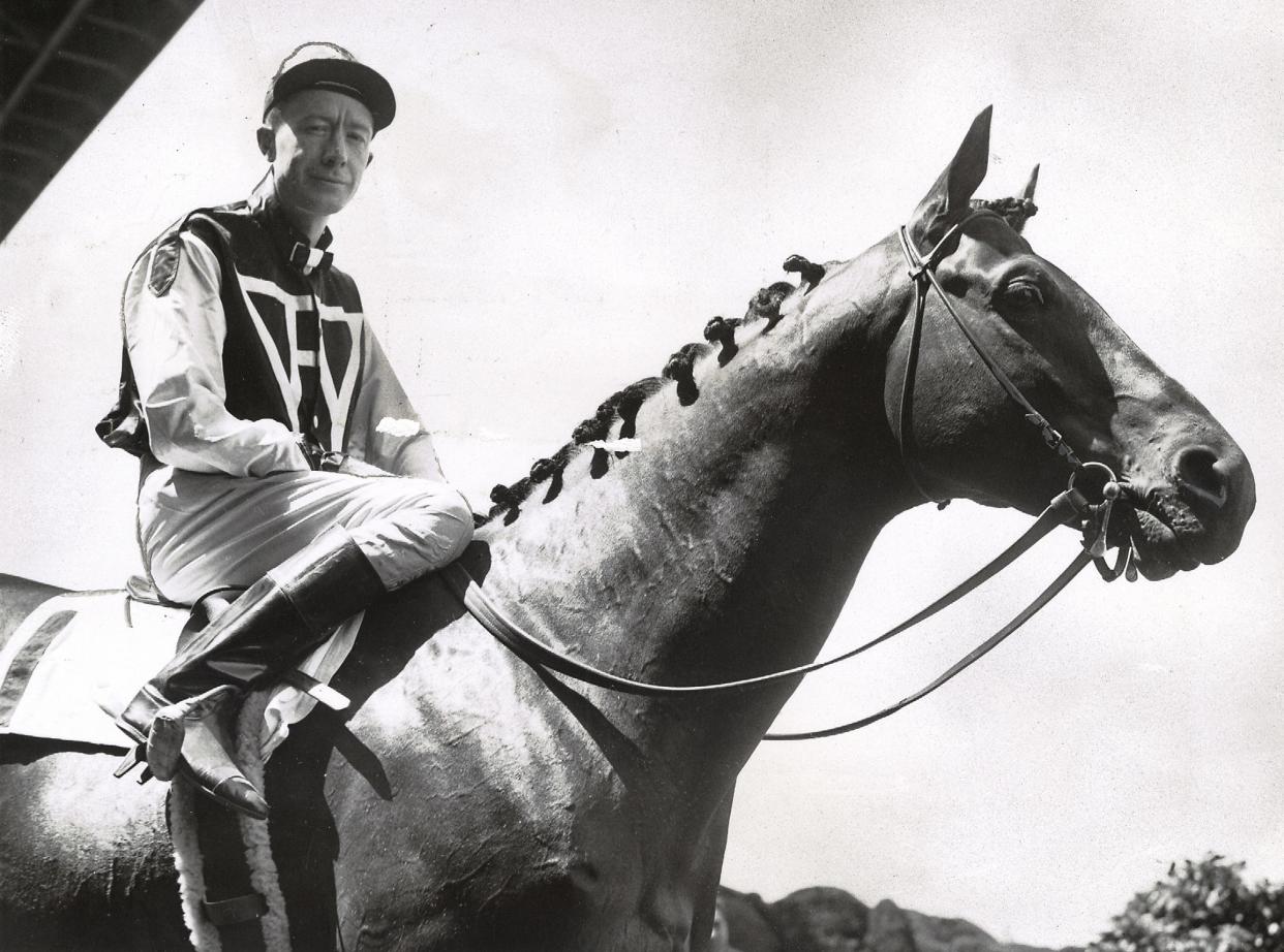 John "Red" Pollard rides Seabiscuit in 1938.