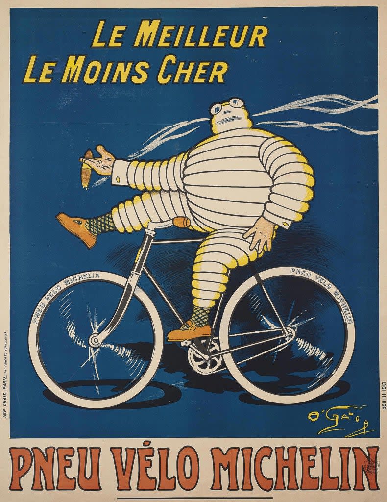 Vintage Michelin poster featuring the Michelin Man riding a bicycle with advertising text