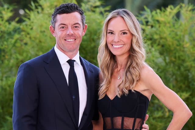 <p>Ross Kinnaird/Getty</p> Rory McIlroy and wife Erica