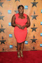 <p>The “Orange Is the New Black” star looked amazing in a form-fitting hot pink dress.</p>