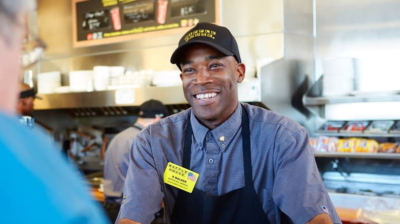employee smiling at customer