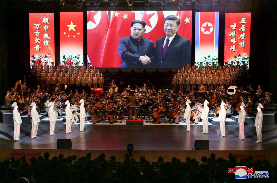 An image of North Korean leader Kim Jong Un and China's President Xi Jinping is displayed during a North Korean delegation's visit in Beijing, China, in this photo released by North Korea's Korean Central News Agency (KCNA) on January 30, 2019. KCNA via REUTERS    ATTENTION EDITORS - THIS IMAGE WAS PROVIDED BY A THIRD PARTY. REUTERS IS UNABLE TO INDEPENDENTLY VERIFY THIS IMAGE. NO THIRD PARTY SALES. SOUTH KOREA OUT. NO COMMERCIAL OR EDITORIAL SALES IN SOUTH KOREA.