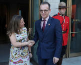 Canada's Minister of Foreign Affairs Chrystia Freeland shakes hands with Minister of Foreign Affairs for Germany Heiko Maas prior to a reception at the Royal Ontario Museum on the first day of of meetings for foreign ministers from G7 countries in Toronto, Ontario, Canada April 22, 2018. REUTERS/Fred Thornhill