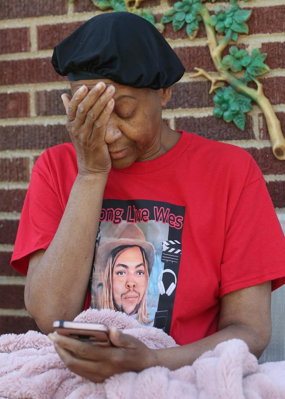 Rebecca Shepard reacts to dealing with the automated FedEx customer service phone system as she tries to get information about missing packages containing the belongings of her Wesley Shepard, 33, who recently died in Los Angeles.