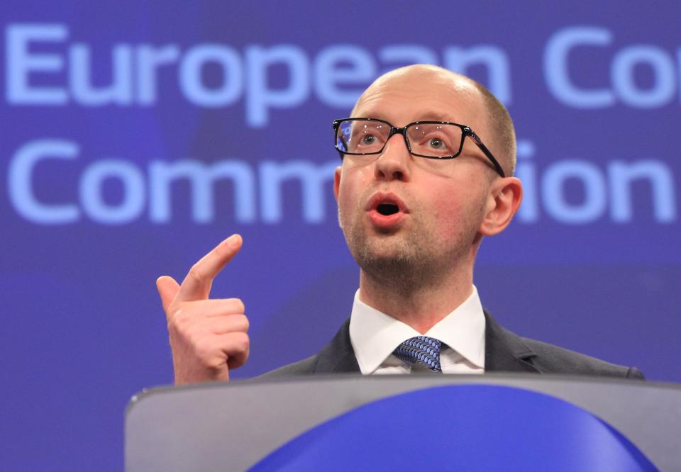 Ukrainian Prime Minister Arseniy Yatsenyuk addresses the media at the European Commission headquarters in Brussels, Tuesday, May 13, 2014. The European Commission says it is determined to help Ukraine, and to make sure that Ukraine has all the support it needs, to undertake the political and economic reforms that are necessary for the country. (AP Photo/Yves Logghe)