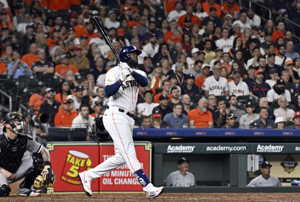 HOUSTON, TX - MARCH 30: Yordan Alvarez #44 of the Houston Astros hits a home run in the ninth inning of the game between the Chicago White Sox and the Houston Astros at Minute Maid Park on Thursday, March 30, 2023 in Houston, Texas. (Photo by Logan Riely/MLB Photos via Getty Images)