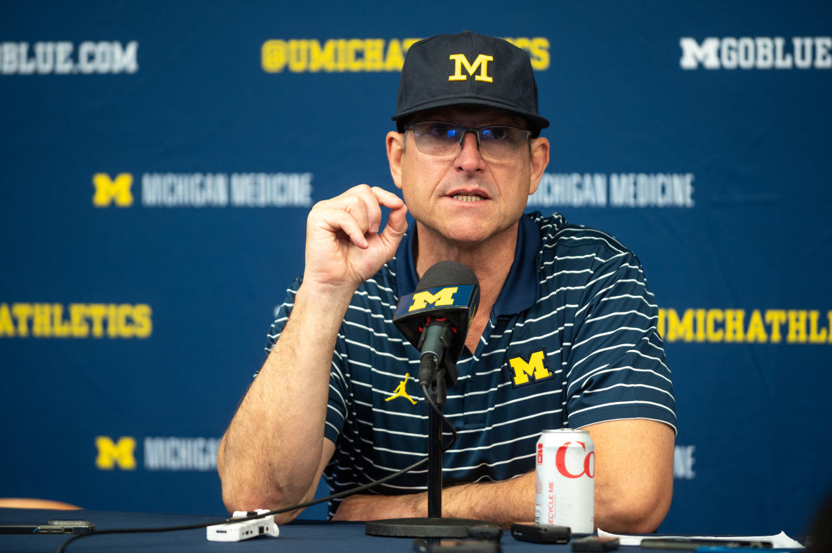 Bagaimana skandal pencurian tanda di Michigan dan penangguhan Jim Harbaugh terjadi