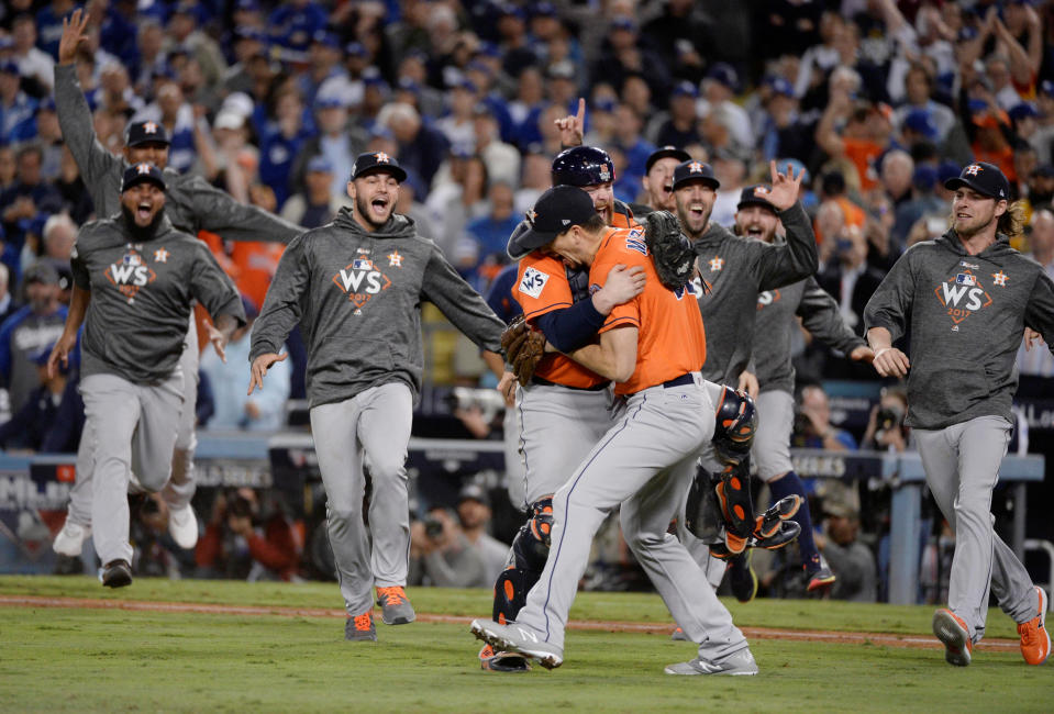 Houston Astros players celebrate after defeating the LA Dodgers in game seven of the 2017 World Series at Dodger Stadium. (Gary A. Vasquez-USA TODAY)