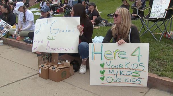 PHOTO: Demonstrators do a sit-in at Colorado state Capitol calling on Gov. Jared Polis to sign an executive order to ban guns and implement a system to buy them back, Denver, June 5, 2023. (KMGH)