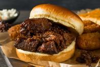 <p><strong>Burnt End Sandwich</strong></p><p>While ribs and brisket take the spotlight in one of America’s barbecue capitals, the local speciality is burnt ends. It’s all about the crisp crunch at <a href="https://www.burntendbbq.com/" rel="nofollow noopener" target="_blank" data-ylk="slk:Burnt End BBQ;elm:context_link;itc:0;sec:content-canvas" class="link ">Burnt End BBQ</a>, with these charred, fattier ends from the point section of the brisket -- covered in sauce, it’s irresistible. </p>