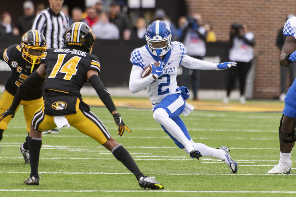 Kentucky wide receiver Barion Brown, right, runs past Missouri defensive back Kris Abrams-Draine, left, during the first quarter of an NCAA college football game Saturday, Nov. 5, 2022, in Columbia, Mo. (AP Photo/L.G. Patterson)