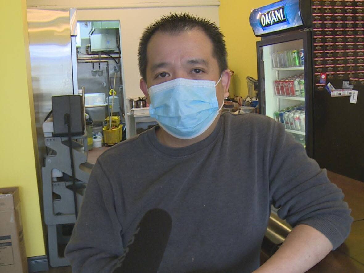 Budi Wibowo is the owner and chef of Bally's Kitchen in Windsor.  (Darrin Di Carlo/CBC - image credit)