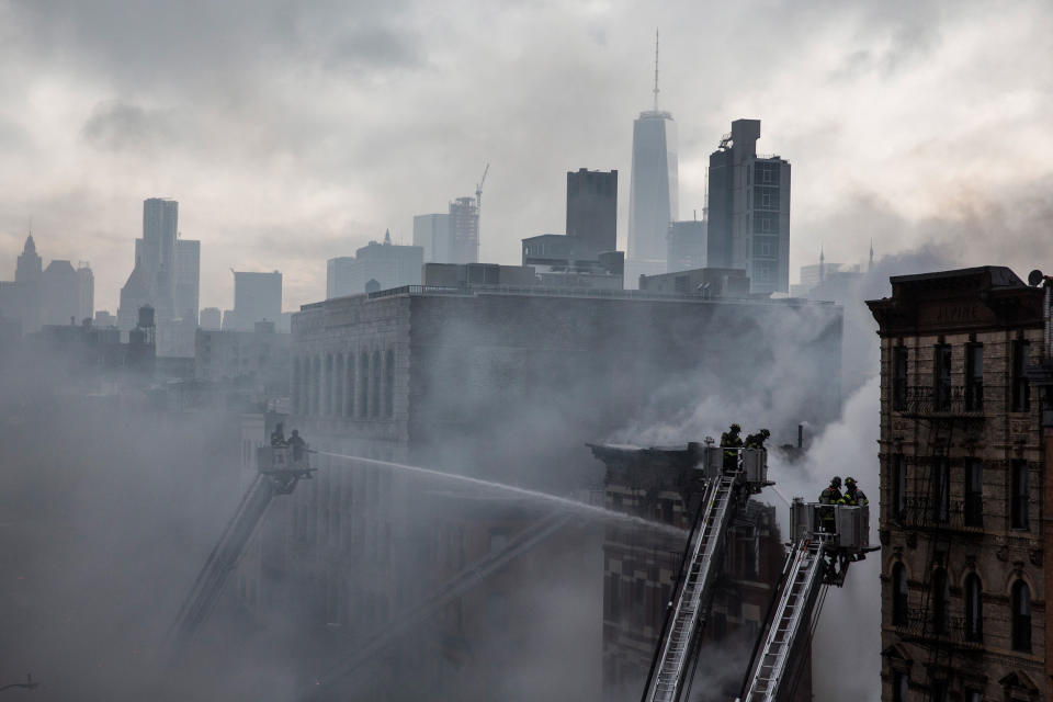 NEW YORK, NY - MARCH 26:  A building burns after an explosion on 2nd Avenue of Manhatten's East Village on March 26, 2015 in New York City.  (Photo by Andrew Burton/Getty Images)