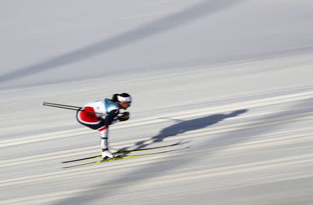 Cross-Country Skiing - Pyeongchang 2018 Winter Olympics - Women's 30km Mass Start Classic - Alpensia Cross-Country Skiing Centre - Pyeongchang, South Korea - February 25, 2018 - Marit Bjoergen of Norway in action. REUTERS/Carlos Barria