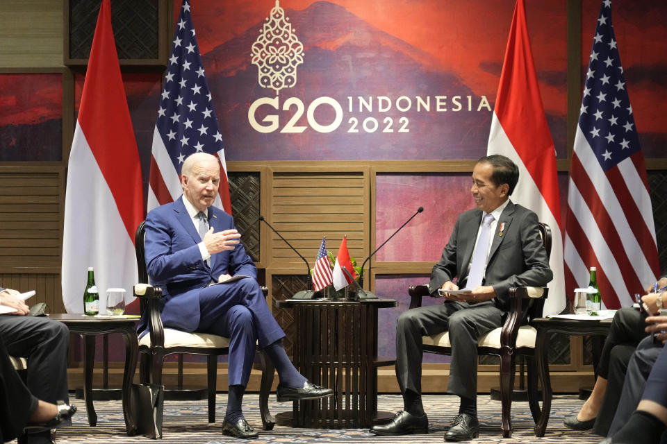 FILE - U.S. President Joe Biden, left, talks with Indonesian President Joko Widodo during their bilateral meeting ahead of the G20 Summit in Nusa Dua, Bali, Indonesia, on Nov. 14, 2022. President Biden and other leaders of the Group of 20 leading economies will meet in Bali, a tropical island in Indonesia, this week. The gathering is the first G-20 summit since before the pandemic to include face-to-face talks between the leaders. (AP Photo/Achmad Ibrahim)