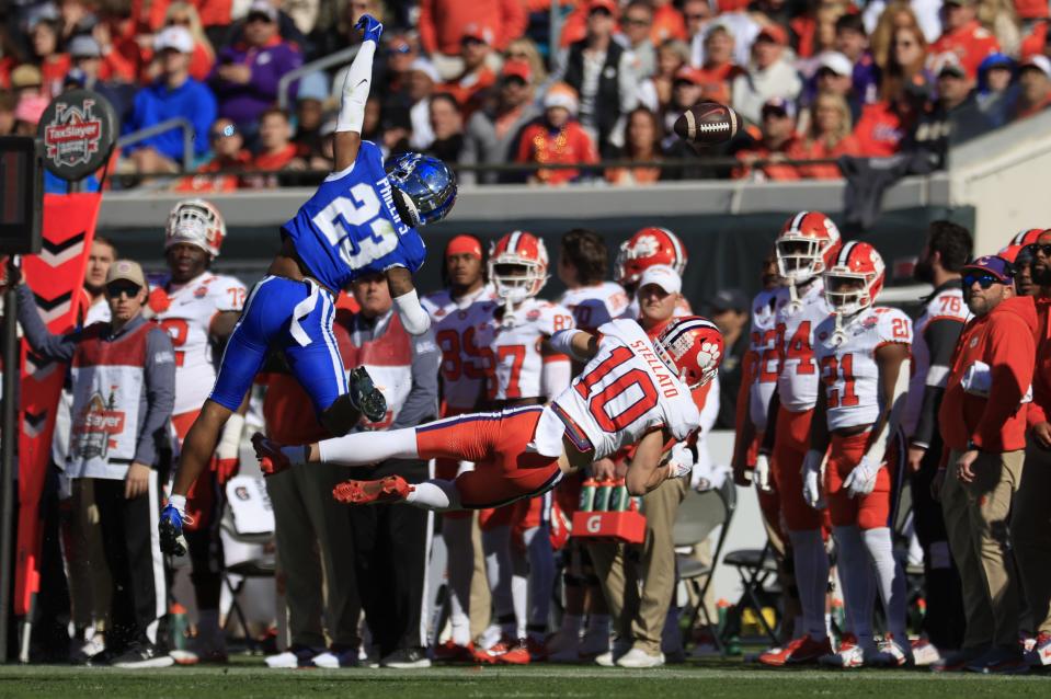 Kentucky Wildcats defensive back Andru Phillips (23) breaks up a pass intended for Clemson Tigers wide receiver Troy Stellato (10) during the second quarter of an NCAA football matchup in the TaxSlayer Gator Bowl Friday, Dec. 29, 2023 at EverBank Stadium in Jacksonville, Fla. [Corey Perrine/Florida Times-Union]