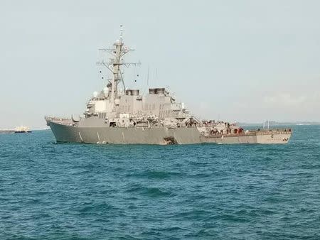 The guided-missile destroyer USS John S. McCain is seen after a collision, off Johor, Malaysia, in this handout August 21, 2017. Royal Malaysian Navy/Handout via Reuters