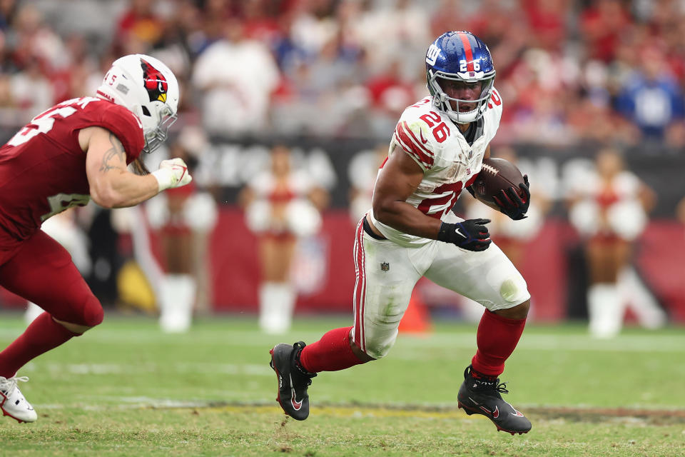 Saquon Barkley was helped off the field on the Giants' final drive in their win against the Cardinals on Sunday.