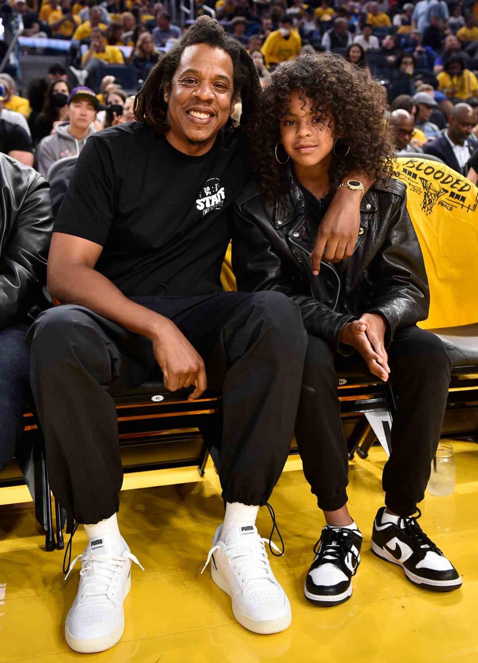 Jay-Z and his daughter Blue Ivy Carter poses for a photo during the game of the Boston Celtics against the Golden State Warriors during Game Five of the 2022 NBA Finals on June 13, 2022 at Chase Center in San Francisco, California